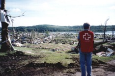 Red Cross Volunteer Jack Burns looks over the Devasted Green Acres Campground